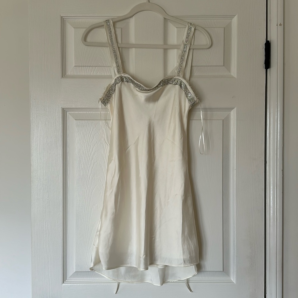 White mini slip dress with crystal rhinestone straps